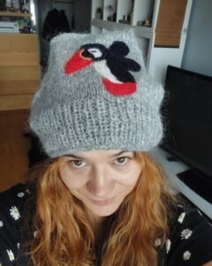 Grey wool hat with puffin